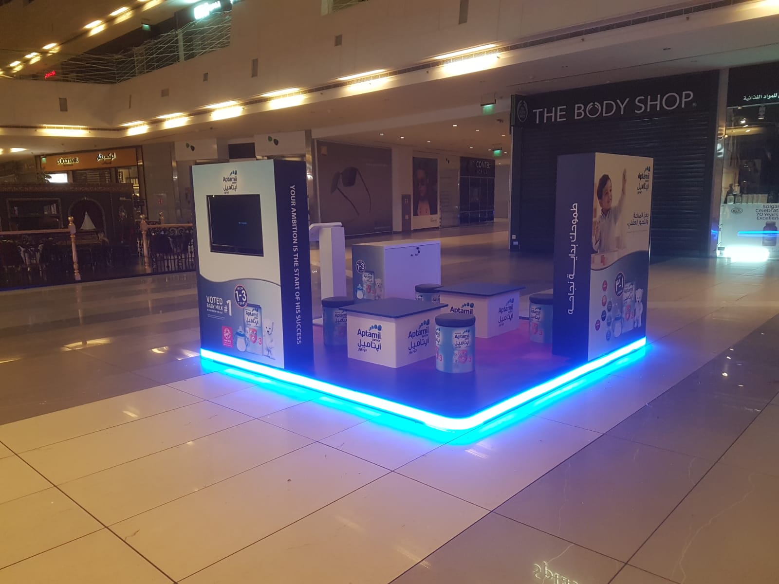 Illuminated island booth for an exhibition